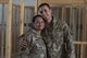 Tech. Sgt. Jason Blunt, 557th RED HORSE craft lead, right, hugs his mom Sgt. Maj. Janet Blunt, U.S. Army Central Forward Command Post G-4 Sgt. Maj. of logistics, during a promotion ceremony Sep. 1, 2017, in Southwest Asia. Both are currently deployed to separate undisclosed locations, but through some coordination Blunt was able surprise her son by attending his promotion ceremony. (U.S. Air Force photo/Senior Airman Damon Kasberg)