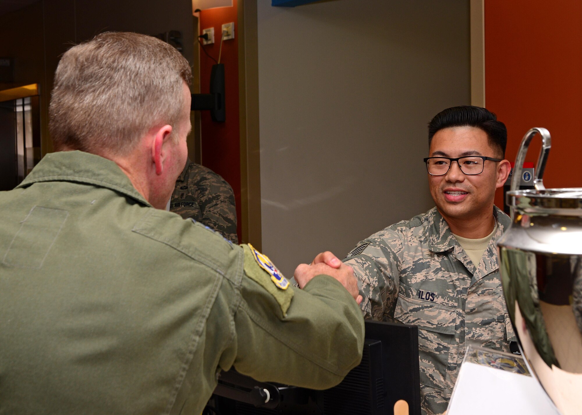 Gen. Tod Wolters, U.S. Air Forces in Europe and Air Forces Africa commander, meets with Staff Sgt. Joab Ilos, 31st Medical Operations Squadron medical technician, Sept. 1, 2017, at Aviano Air Base, Italy. The commander spent the day visiting Airmen throughout several base facilities and speaking with wing leadership.  (U.S. Air Force photo by Airman 1st Class Ryan Brooks)