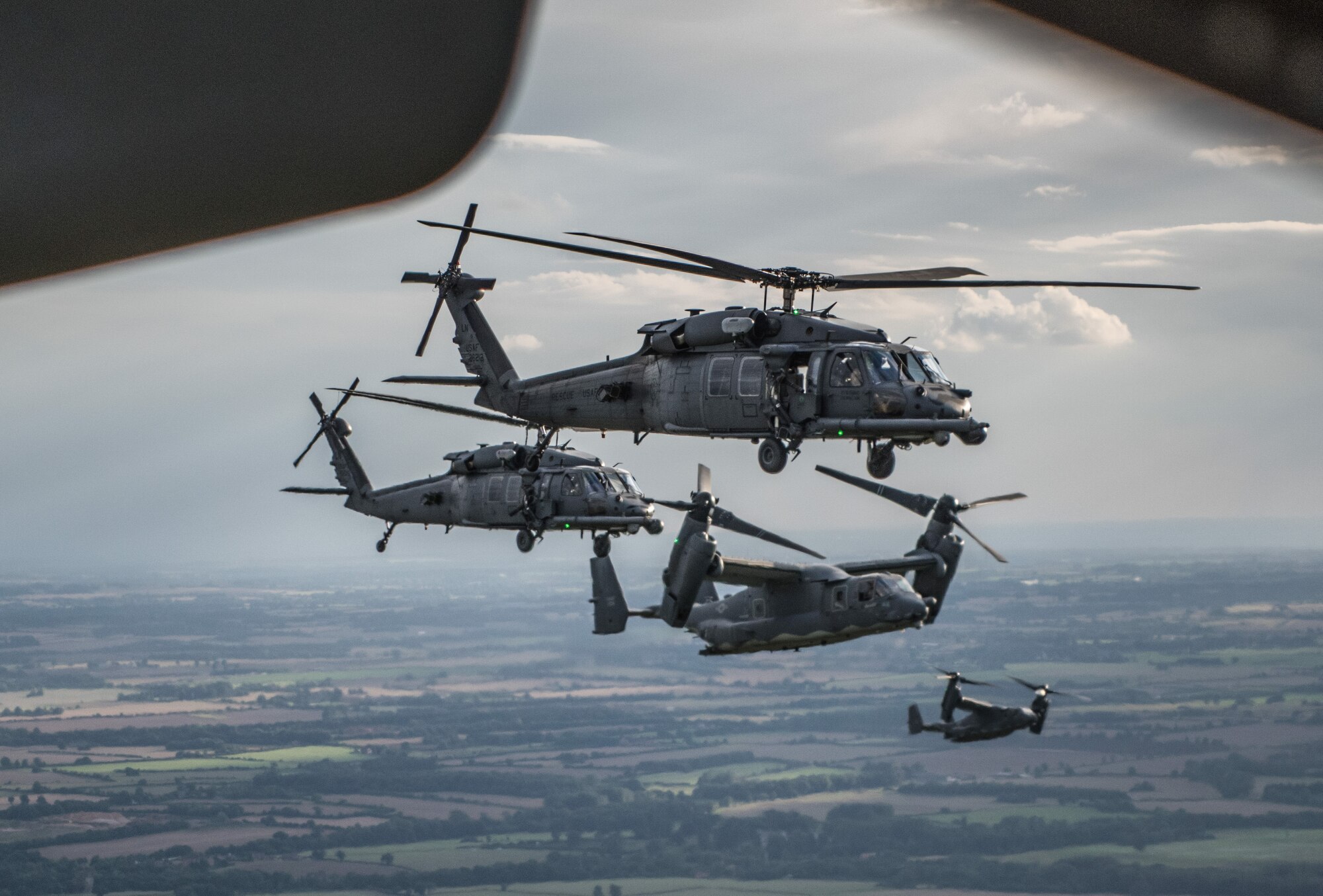 CV-22 Osprey's from the 352d Special Operations Wing and HH-60 Pave Hawks from the 48th Fighter Wing flew together in a joint formation around southern England Aug. 31, 2017. The aircrews performed aerial maneuvers, practiced medical evacuation procedures, and fast rope techniques in order to maintain flight proficiency and align their unique capabilities.