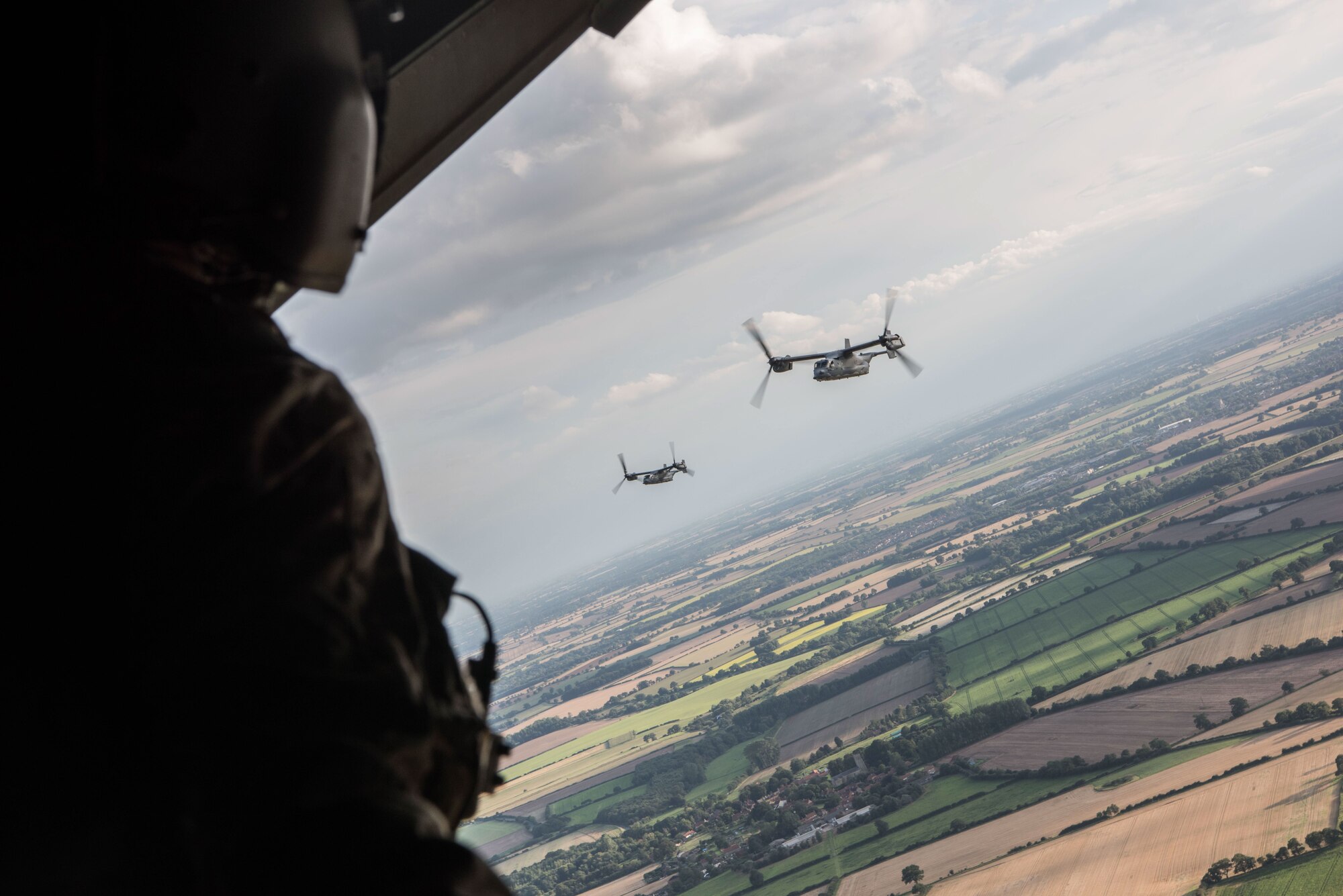 CV-22 Osprey's from the 352d Special Operations Wing and HH-60 Pave Hawks from the 48th Fighter Wing flew together in a joint formation around southern England Aug. 31, 2017. This flight gave pilots of both units the ability to practice working together in different formations and to hone how they would act and react as a team.