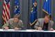 Gen. Ellen M. Pawlikowski, Air Force Materiel Command commander, and Troy Tingey, American Federation of Government Employees Council 214 president, add their signatures to the Master Labor Agreement during a signing ceremony at Headquarters Air Force Materiel Command Aug. 23, 2017. (U.S. Air Force photo/Michelle Gigante)