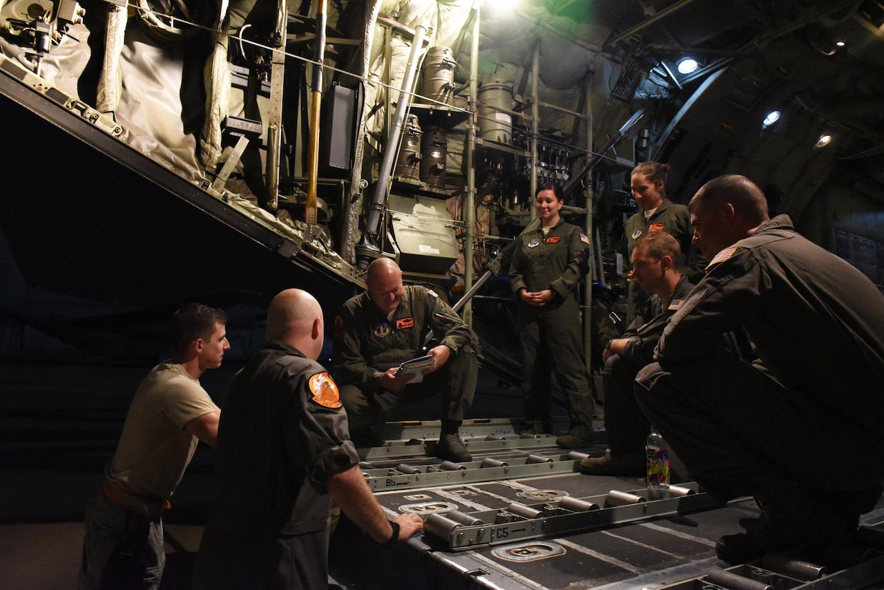 Illinois Air National Guard conduct a pre-flight brief