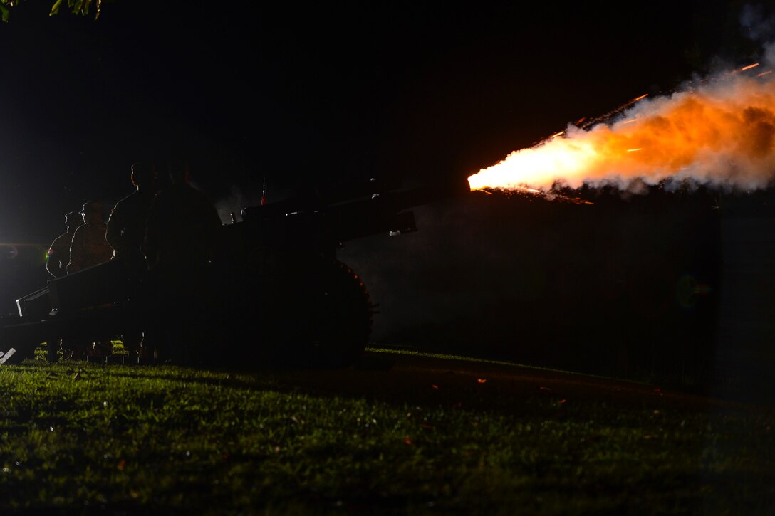 The U.S. Army Training and Doctrine Command Salute Battery fires cannons during the “Music Under the Stars” season finale concert at Joint Base Langley-Eustis, Va., Aug. 31, 2017.