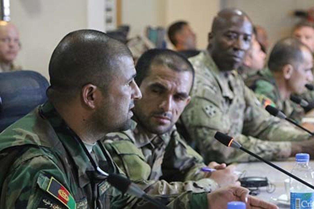 Service members discuss improving Afghan forces.