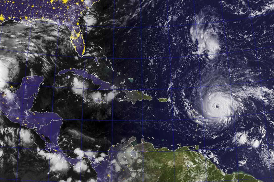 A satellite image shows the eye of Hurricane Irma, now a Category 5 storm.