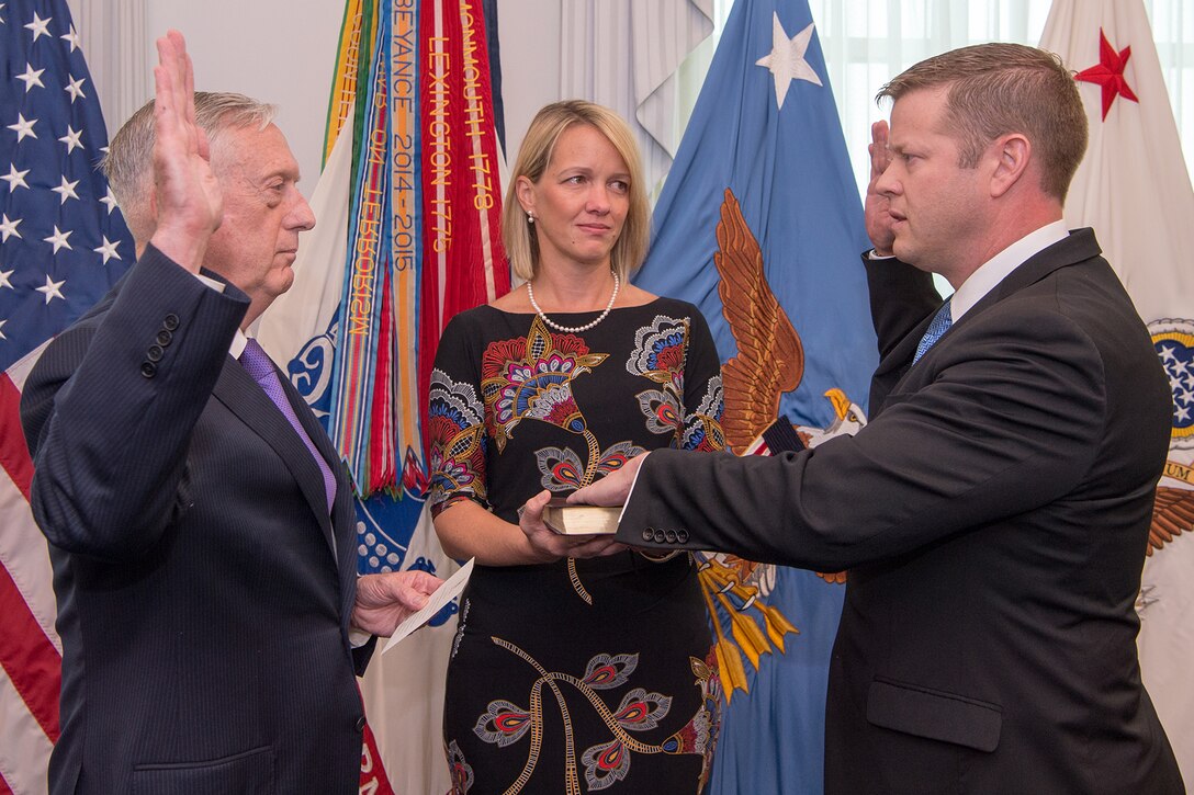 A man gets sworn in as the undersecretary of the Army.