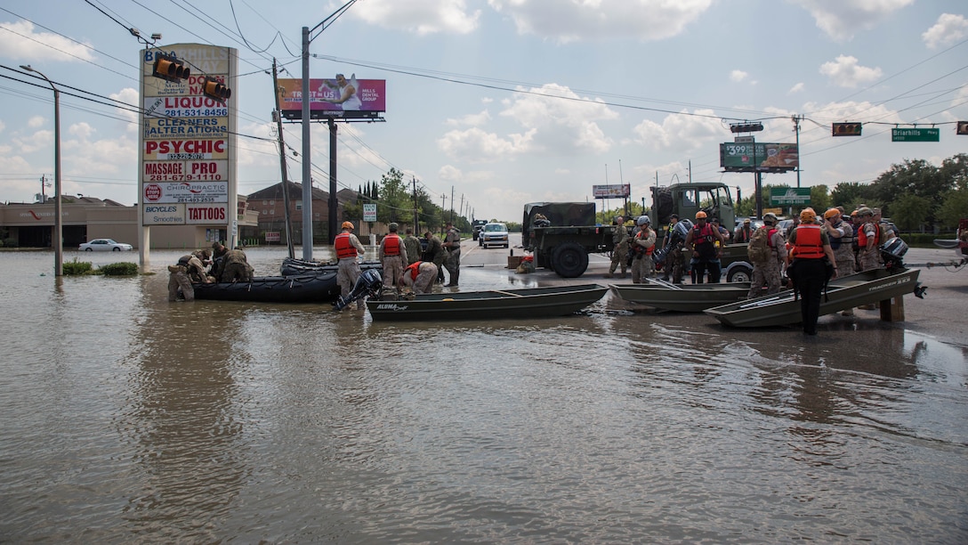 Marines with Charlie Company, 4th Reconnaissance Battalion, 4th Marine Division, Marine Forces Reserve and Texas State Guardsmen, ready their boats for rescue missions in Houston, Texas, Aug. 31, 2017. Marines from Charlie Company assisted rescue effort in wake of Hurricane Harvey by providing Zodiacs and personal to local law enforcement.