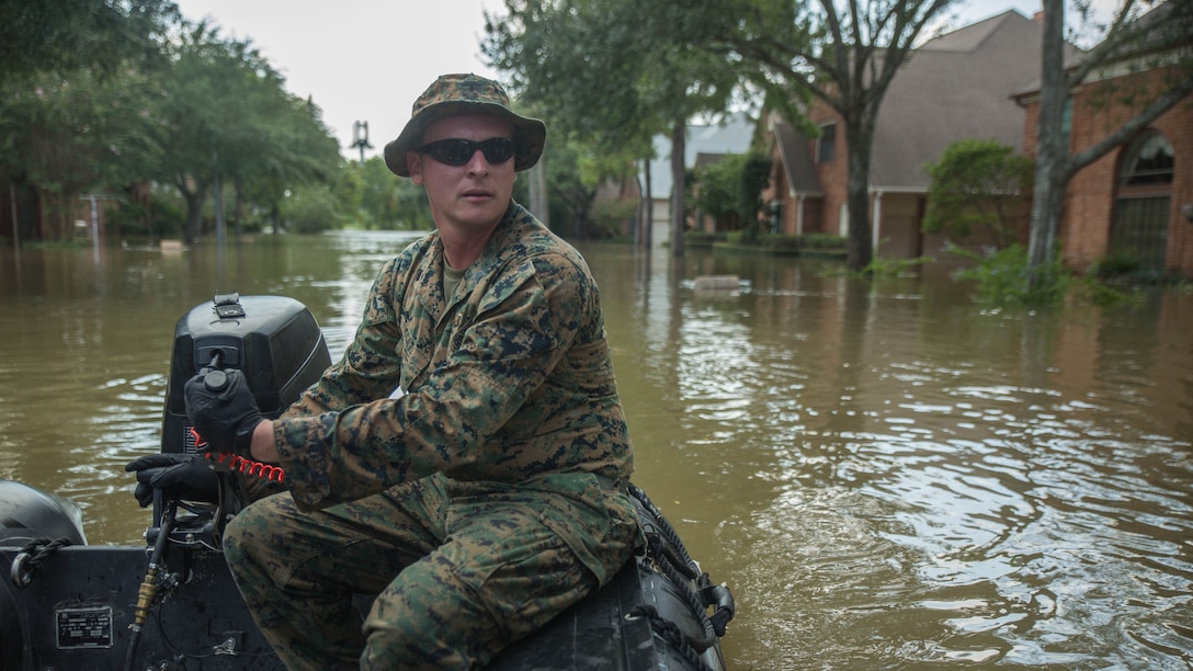 Marine Corps Sgt. Brad Coats, a reconnaissance Marine with Charlie Company, 4th Reconnaissance Battalion, 4th Marine Division, Marine Forces Reserve, steers a Marine Corps F470 Zodiacs Combat Rubber Raiding craft through a flooded street in Houston, Texas, Aug. 31, 2017. Marines from Charlie Company assisted rescue effort in wake of Hurricane Harvey by providing Zodiacs and personal to local law enforcement.