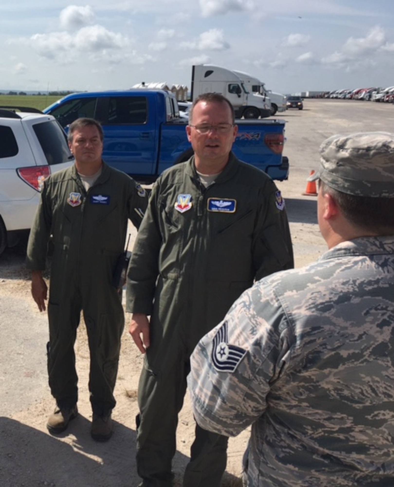Col. Dave Edwards (right) and Col. Harry Hughes, reservists assigned as Emergency Preparedness Liaison Officers to the Federal Emergency Management Agency, work on the flightline at Joint Base San Antonio-Seguin Auxiliary Airfield Sept. 5, 2017.  Helping local response agencies coordinate with one another is a primary responsibility for EPLOs. (U.S. Air Force photo by Dan Hawkins)