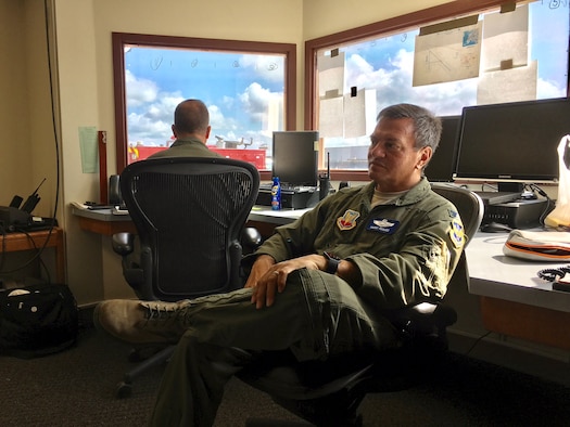 Col. Harry Hughes, a reservist assigned as Emergency Preparedness Liaison Officer to the Federal Emergency Management Agency-Region 8, listens to a Hurricane Harvey relief effort update at Joint Base San Antonio-Seguin Auxiliary Airfield Sept. 5, 2017.  Helping local response agencies coordinate with one another is a primary responsibility for EPLOs. (U.S. Air Force photo by Dan Hawkins)