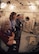 Tech. Sgt. Samantha Soran, back, 60th Medical Group flight chief hyperbaric medicine, informs civic leaders from Colorado about the hyperbaric chamber capabilities, Aug. 24, 2017 at Travis Air Force Base, Calif.