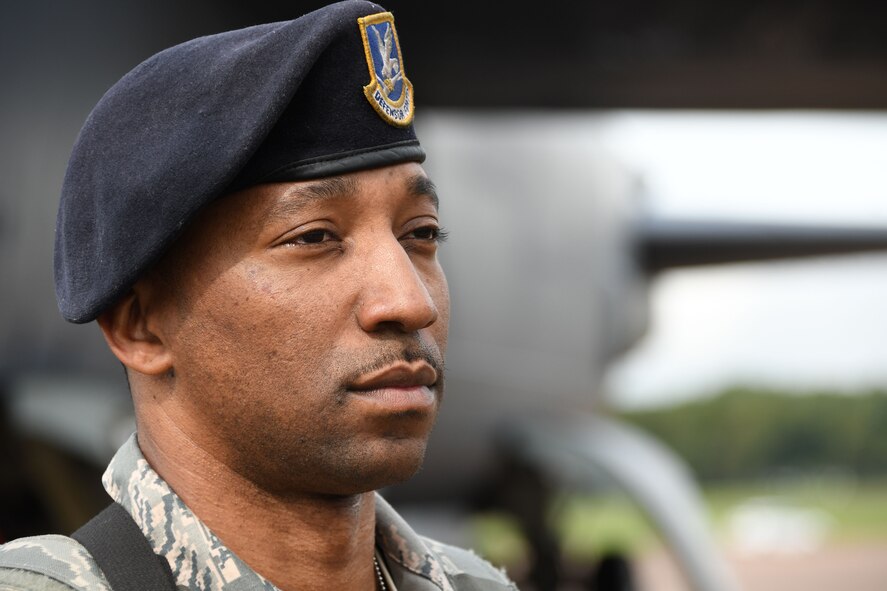 U.S. Air Force Tech. Sgt. Troderick Trotter, 307th Security Forces Squadron, keeps careful watch while guarding a B-52 Stratofortress on the flight line at Royal Air Force Fairford, United Kingdom, Sep. 4, 2017.