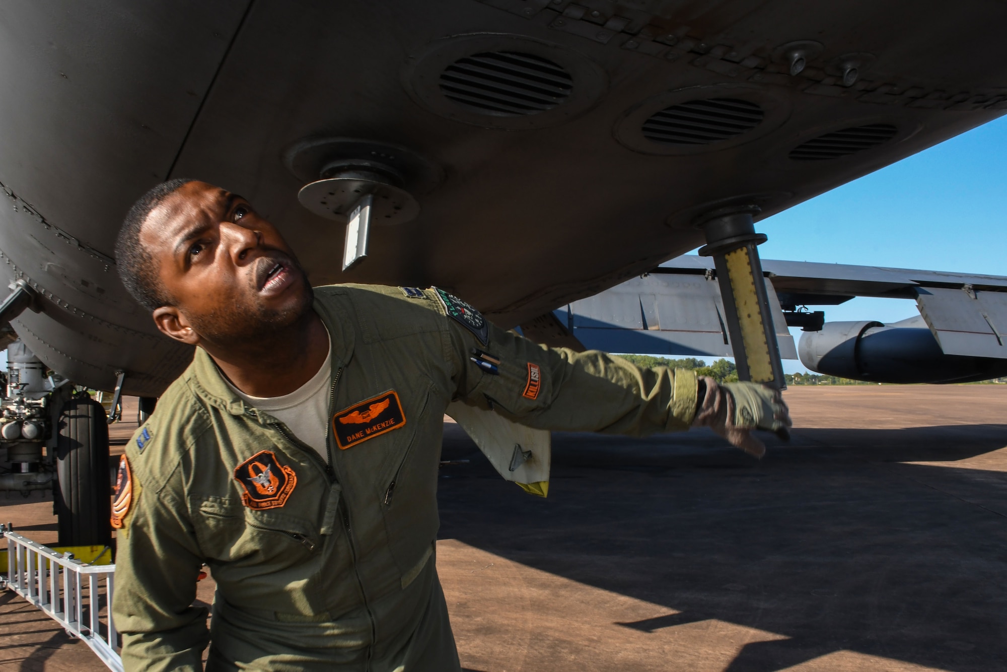 U.S. Air Force Capt. Dane McKenzie, 343rd Bomb Squadron electronic warfare officer, inspects a B-52 Stratofortress prior to flying a mission from Royal Air Force Fairford, United Kingdom, Sep. 1, 2017.