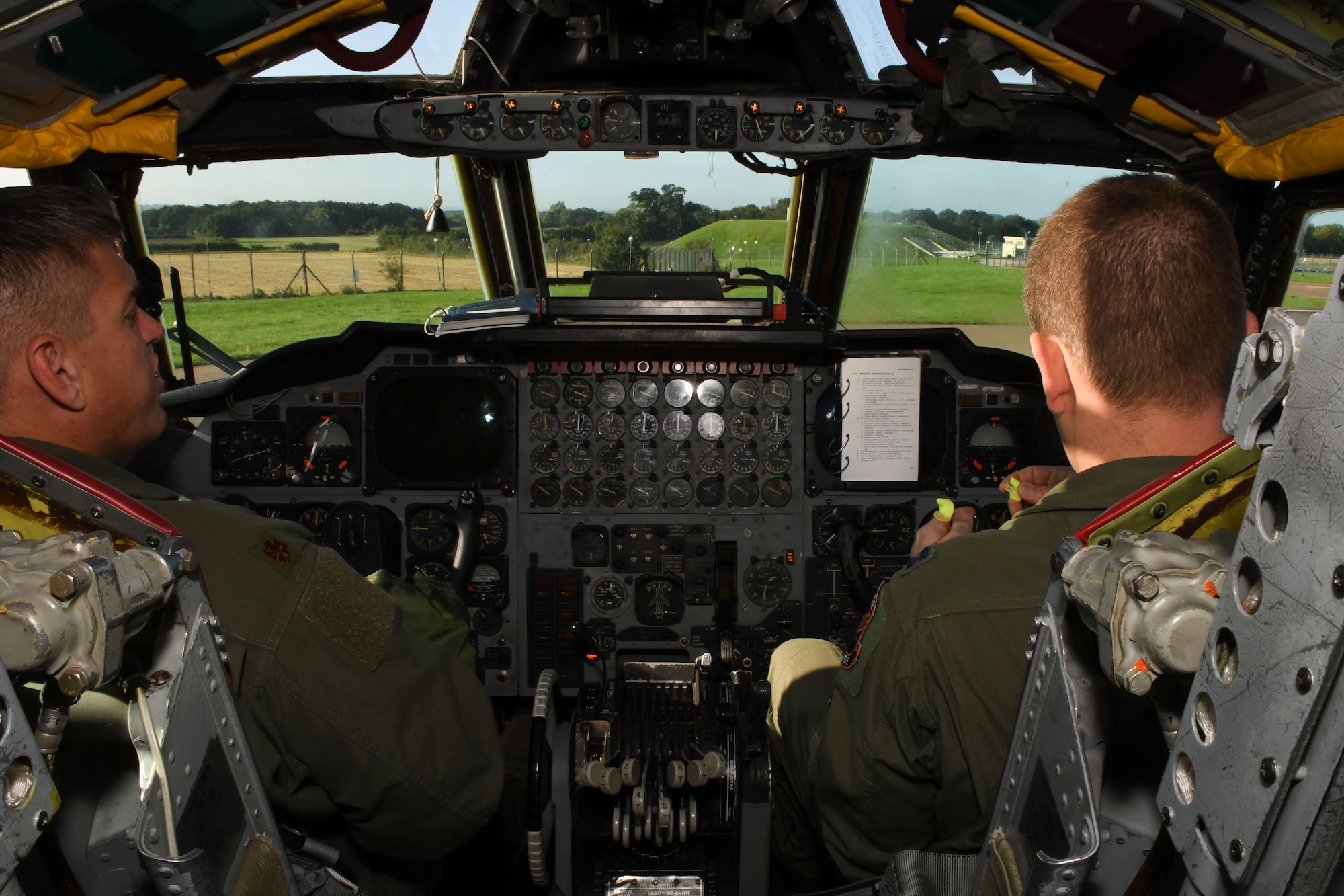 Pilots from the 343rd Bomb Squadron run through their checks in the cockpit of a B-52 Stratofortress at Royal Air Force Fairford, United Kingdom, Sep. 1, 2017.