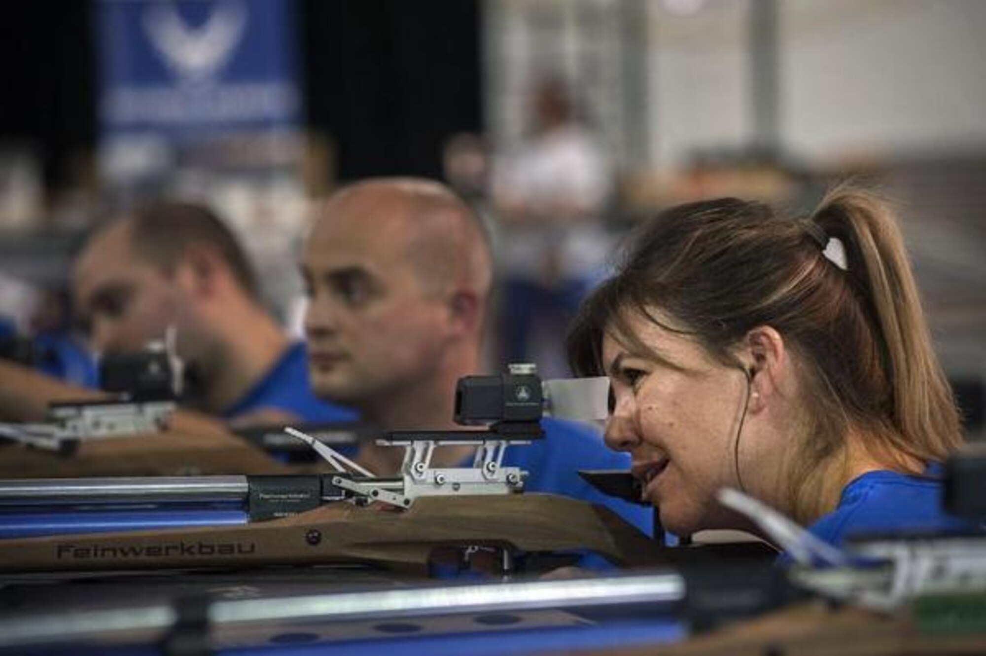 Vickie LeBrun, of Great Falls, Montana, takes aim with an air rifle during the annual Joint Northwest Regional CARE event on Lewis Main. The Air Force Wounded Warrior Program conducts these events throughout the U.S. at 6 different locations. (Courtesy photo).