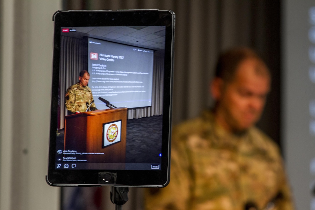 Col. Lars Zetterstrom, Galveston District commander, briefs local and national media here on the plan to gradually reduce releases from Addicks and Barker dams, which began yesterday.