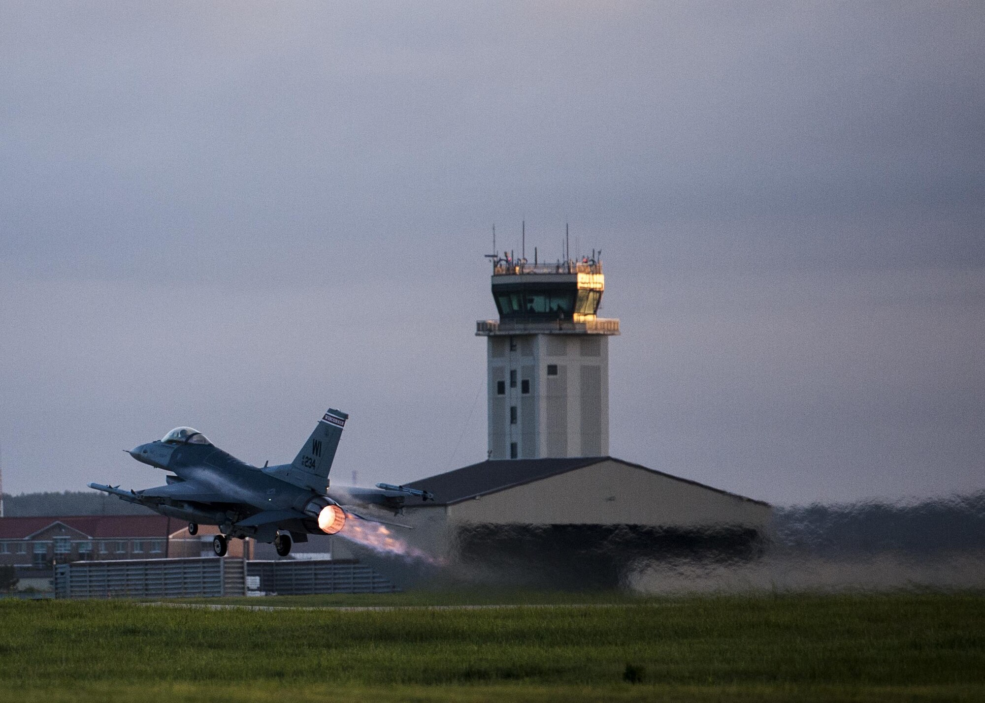 A U.S. Air Force F-16 Fighting Falcon takes off from the runway at Kunsan Air Base, Republic of Korea, Aug. 23, 2017. Airmen assigned to the 8th Fighter Wing and the 115th Fighter Wing, Wisconsin Air National Guard, participated in Beverly Pack 17-3, a five-day, regularly-scheduled operational readiness exercise, which tested the base’s ability to respond to various scenarios in a contingency environment. Airmen from the 115th FW are deployed to Kunsan for a 4-month rotation as part of a Theater Security Package, which helps to maintain a deterrent against threats to regional security and stability. (U.S. Air Force photo by Senior Airman Colville McFee/Released)
