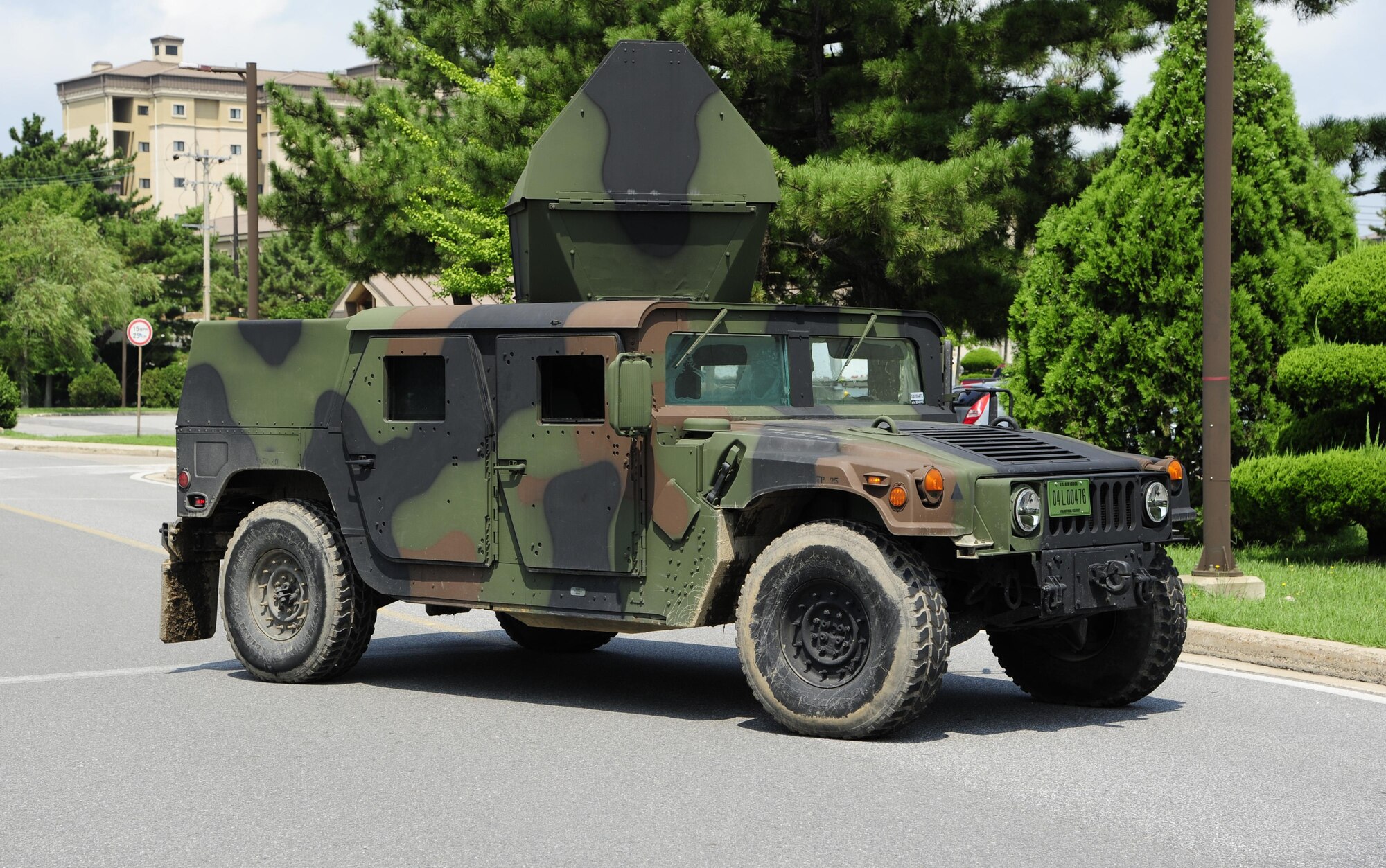 An U.S. Air Force 8th Security Forces Squadron Humvee sits in an intersection during the regularly scheduled training exercise, Beverly Pack 17-3, at Kunsan Air Base, Republic of Korea, Aug. 22, 2017. Security Forces Airmen used the Humvee as a road block to stop oncoming traffic from entering a restricted area and keep people out of harm’s way during a suspicious package simulation. (U.S. Air Force photo by Senior Airman Colby L. Hardin/Released)