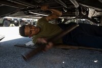 Lance Cpl. Isaiah J. Ali, a native of New York and a motor transport mechanic with III Marine Headquarters Group, III Marine Expeditionary Force, performs routine maintenance on the M1123 High Mobility Multipurpose Wheeled Vehicle (HMMWV) steering system on Camp Hansen, Okinawa, Japan, Sep. 6, 2017.HMMWVs are typically used for transporting gear, ammunition and troops. (U.S. Marine Corps photo by Lance Cpl. Deseree Kamm)