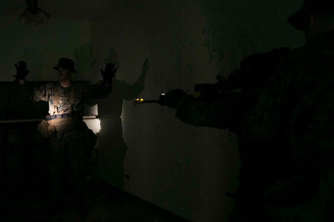 Marines with Battalion Landing Team, 3rd Battalion, 5th Marines, conduct Military Operations in Urbanized Terrain (MOUT) training at Andersen South Air Force Base, Guam, August 30, 2017