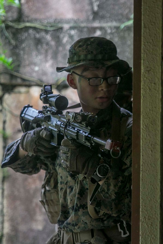 Marines with Battalion Landing Team, 3rd Battalion, 5th Marines, conduct Military Operations in Urbanized Terrain (MOUT) training at Andersen South Air Force Base, Guam, August 30, 2017