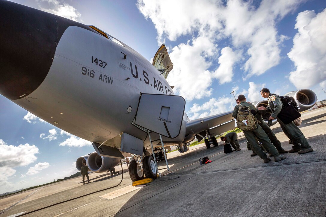 airmen prepare to board a KC-135R Stratotanker at St. Croix