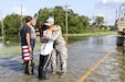 Staff Sgt. Darrell Thibeaux, a human resources specialist with the 373rd Combat Sustainment Support Brigade, is thanked by a survivor during a high water rescue mission in Beaumont, Texas, Sept. 1, 2017. Soldiers of 373rd CSSB, along with several of their vehicles, were attached to the Beaumont Fire Department conducting high water rescue missions. Within a few days time frame they were able to evacuate over 700 citizens, roughly 170 animals and had assisted with transporting over 100 emergency personnel. (U.S. Army photo by Sgt. Heather Doppke/released)