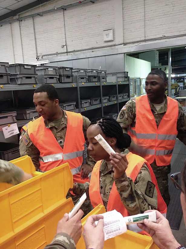 Army medical supply specialists Spc. Tevin Beaty, Spc. Brittany Griffie and Sgt. Lorrence Wilder sort materials for packaging at U.S. Army Medical Materiel Center Europe in Pirmasens, Germany. DLA Troop Support’s Medical supply chain employees work with USAMMCE personnel to connect U.S. military healthcare providers with more than 1,000 pharmaceutical manufacturers.