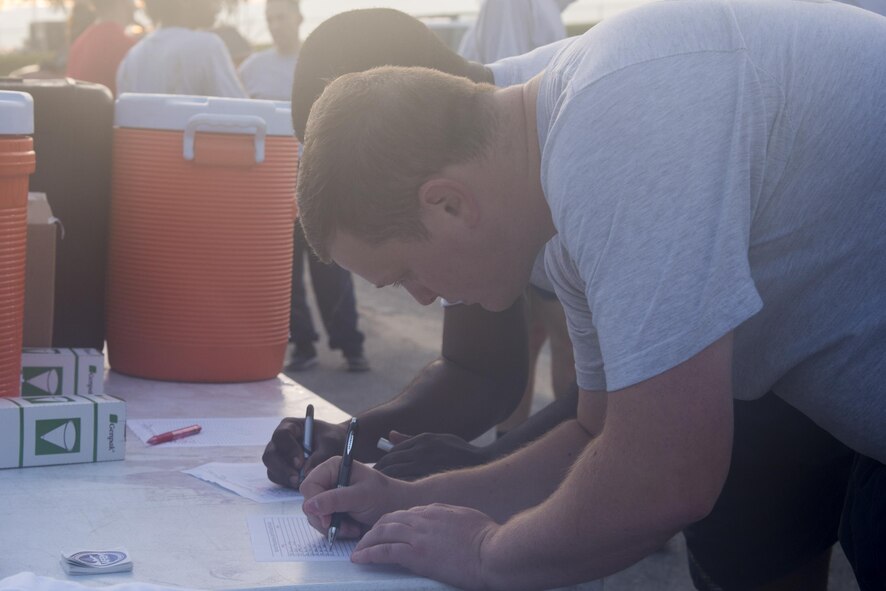 Airmen register for the National Preparedness Month 5k fun run, Sept. 1, 2017, at Moody Air Force Base, Ga. National Preparedness Month is designed to educate and empower not only the base, but also the community on preparing for any disaster. (U.S. Air Force photo by Airman 1st Class Erick Requadt)