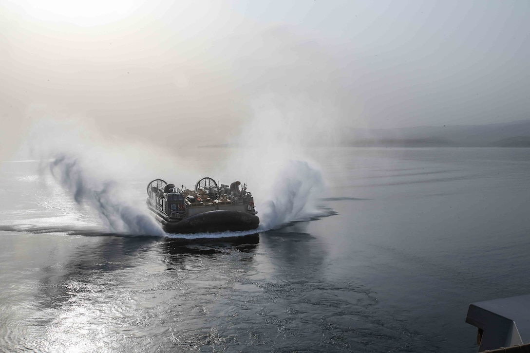 An air-cushioned landing craft approaches the amphibious transport dock ship USS San Diego during exercise Alligator Dagger off the coast of Djibouti