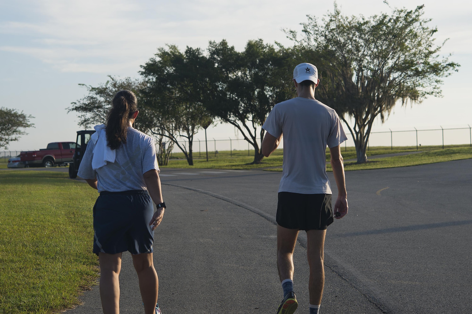 Master Sgt. Regina Dockens, 23d Communication Squadron first sergeant, left, and Capt. Austin Gibbons, 23d Operations Support Squadron flight commander of weather, walk away after finishing the National Preparedness Month 5k fun run, Sept. 1, 2017, at Moody Air Force Base, Ga. National Preparedness Month is designed to educate and empower not only the base, but also the community on preparing for any disaster. (U.S. Air Force photo by Airman 1st Class Erick Requadt)