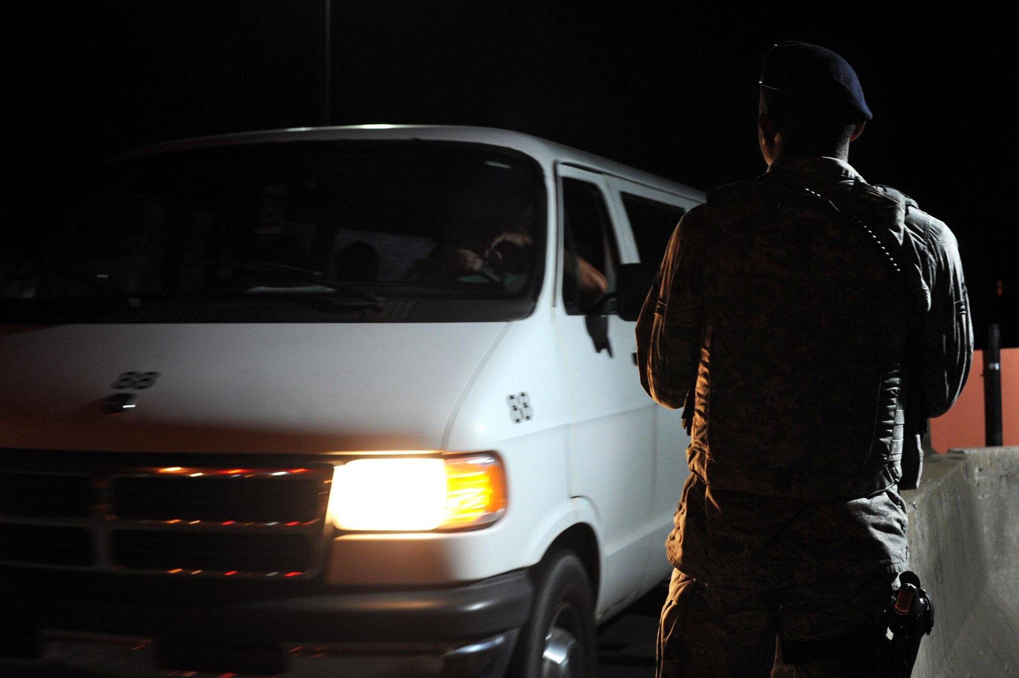 Airman 1st Class Lovell Smith, 19th Security Forces Squadron Defender, greets base personnel entering the installation Aug. 29, 2017, at Little Rock Air Force Base, Ark. The Airmen work 24/7, 365 days a year to keep the installation and personnel safe. (U.S. Air Force photo by Airman 1st Class Grace Nichols)