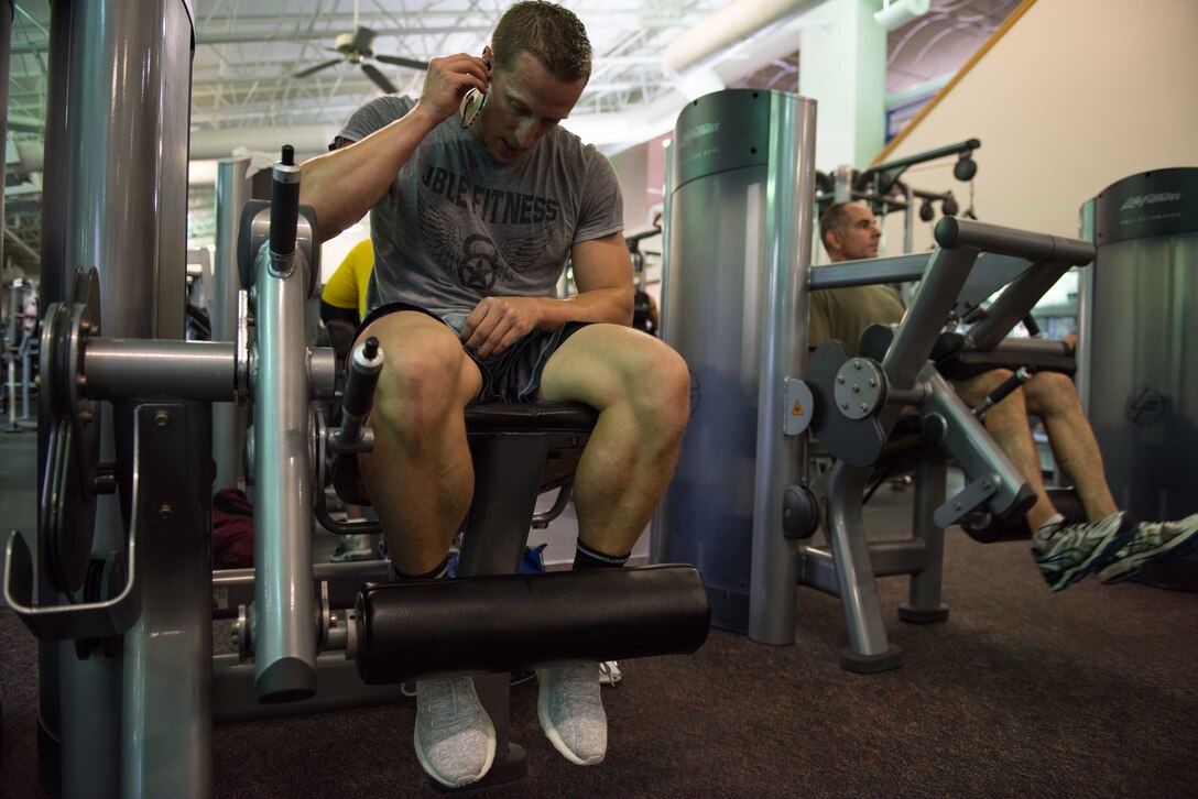 U.S. Air Force 1st Lt. James LaCoste, 633rd Force Support Squadron chief career development element, rests after leg-curl sets at Joint Base Langley-Eustis, Va., July 20, 2017. While training for a bodybuilding competition, LaCoste would drop his caloric intake from 4,000 to 2,000 calories and used cardio workouts to continue his weight loss. (U.S. Air Force photo by Staff Sgt. J.D. Strong II)