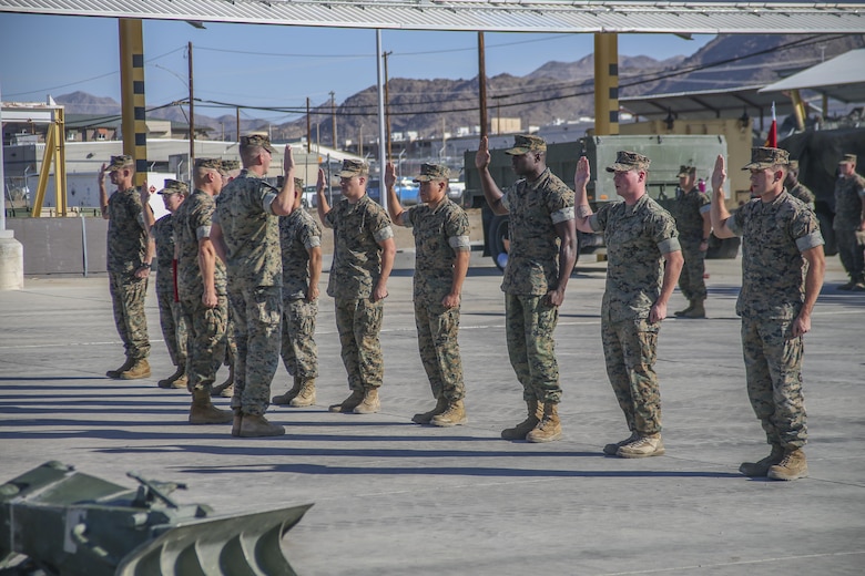 U.S. Marines with 3rd Battalion, 11th Marines, recites the oath of reenlistment administered by Lt. Col. Robert G. McCarthy, Commanding Officer, 3rd Battalion, 11th Marines during a mass reenlistment ceremonry abord the Marine Corps Air Ground Combat Center, Twentynine Palms, Calif., Aug 24, 2017. The Oath Reaffirms the Marines commitment to the Marine Corps and to the Nation.