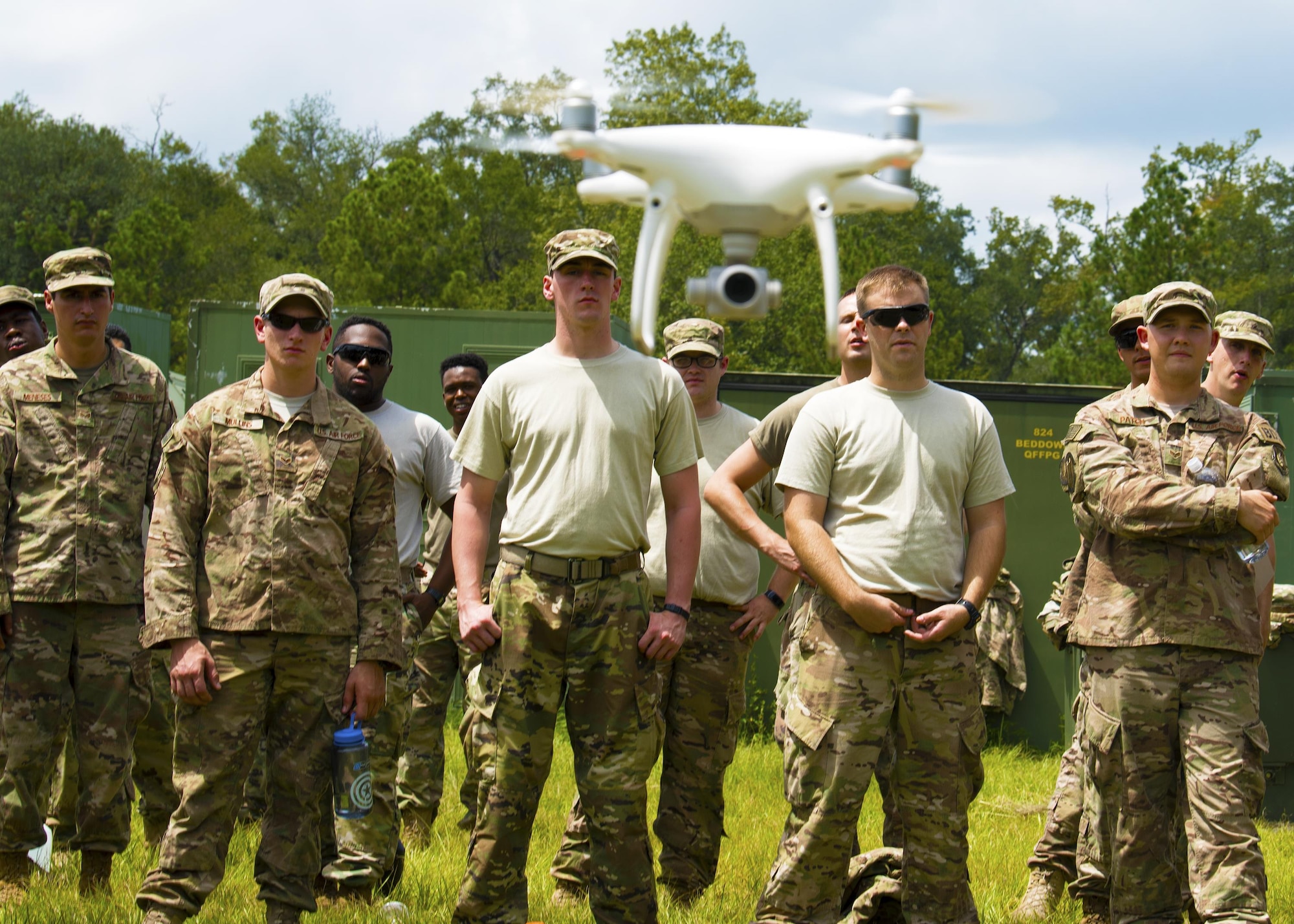 Airmen from the 823d Base Defense Squadron watch a drone ascend into the sky, Aug. 30, 2017, at Moody Air Force Base, Ga.  Airmen from the 823d BDS we’re taught the basics of drone detection, identification and neutralization to ensure readiness while deployed. (U.S. Air Force photo by Airman Eugene Oliver)