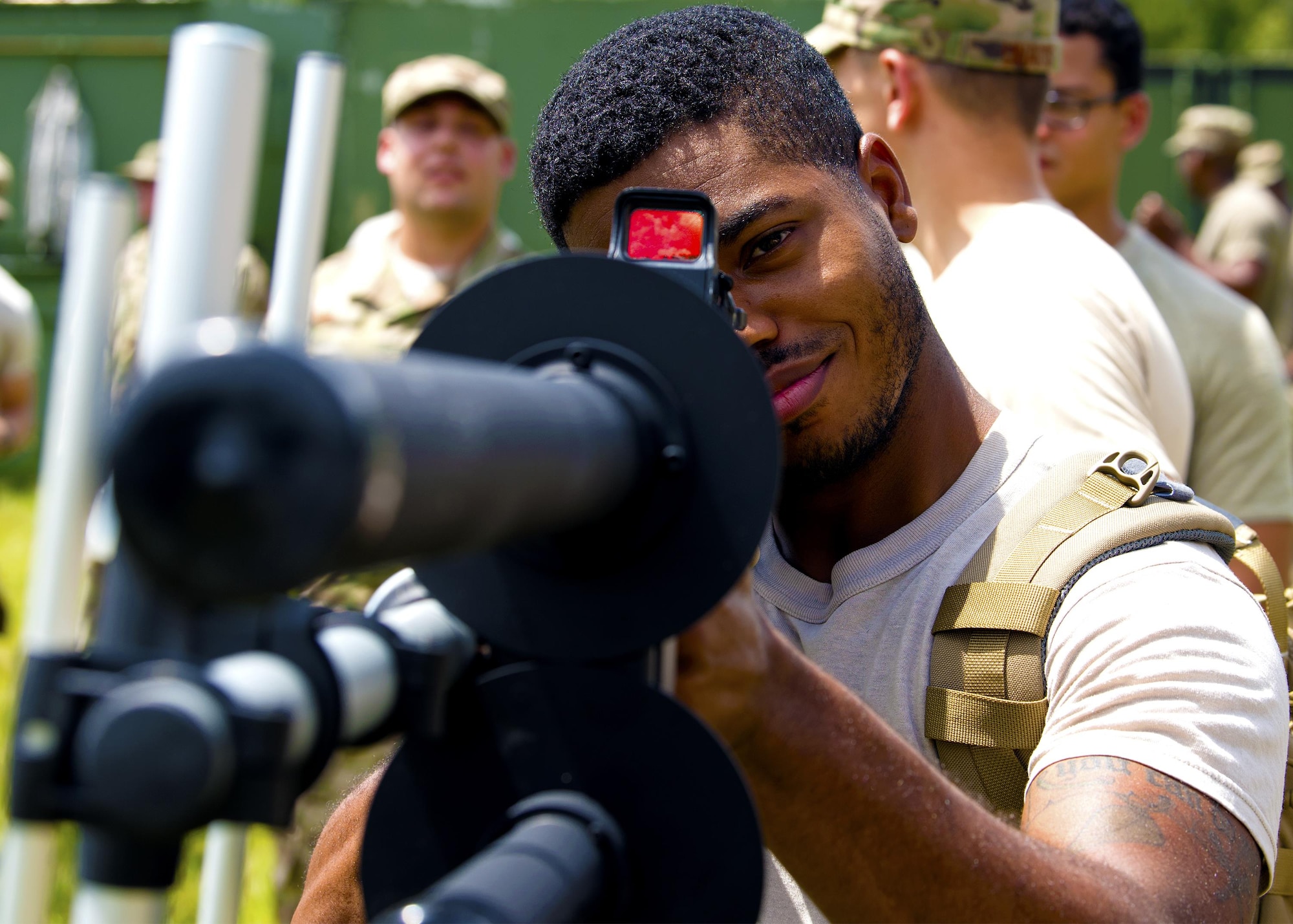 Senior Airman Johnny Hillary, fire team member from the 823d Base Defense Squadron aims down on the holographic scope of a drone defender rifle, Aug. 30, 2017, at Moody Air Force Base, Ga. Airmen from the 823d BDS were taught the basics of drone detection, identification and neutralization to ensure readiness while deployed.  (U.S. Air Force photo by Airman Eugene Oliver)