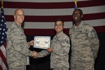 Airmen receive certificates for their selection to staff sergeant Aug. 24, 2017, at McConnell Air Force Base, Kan. The Air Force selected 14,181 senior airmen for promotion, 186 of which are assigned to McConnell. (U.S. Air Force photo/Airman 1st Class Erin McClellan)