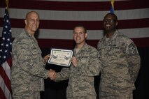 Airmen receive certificates for their selection to staff sergeant Aug. 24, 2017, at McConnell Air Force Base, Kan. The Air Force selected 14,181 senior airmen for promotion, 186 of which are assigned to McConnell. (U.S. Air Force photo/Airman 1st Class Erin McClellan)