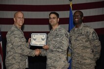 Airmen receive certificates for their selection to staff sergeant Aug. 24, 2017, at McConnell Air Force Base, Kan. The Air Force selected 14,181 senior airmen for promotion, 186 of which are assigned to McConnell. (U.S. Air Force photo/Airman 1st Class Erin McClellan)