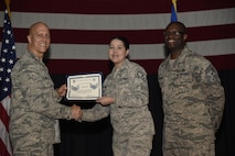 Airmen receive certificates for their selection to staff sergeant Aug. 24, 2017, at McConnell Air Force Base, Kan. The Air Force selected 14,181 senior airmen for promotion, 186 of which are assigned to McConnell. (U.S. Air Force photo/Airman 1st Class Erin McClellan)