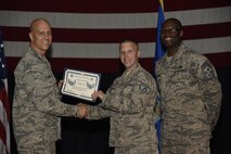 Airmen receive certificates for their selection to staff sergeant Aug. 24, 2017, at McConnell Air Force Base, Kan. The Air Force selected 14,181 senior airmen for promotion, 186 of which are assigned to McConnell. (U.S. Air Force photo/Airman 1st Class Erin McClellan)