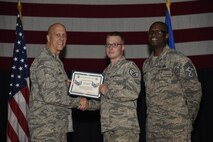 Airmen receive certificates for their selection to staff sergeant Aug. 24, 2017, at McConnell Air Force Base, Kan. The Air Force selected 14,181 senior airmen for promotion, 186 of which are assigned to McConnell. (U.S. Air Force photo/Airman 1st Class Erin McClellan)