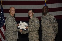 Airmen receive certificates for their selection to staff sergeant Aug. 24, 2017, at McConnell Air Force Base, Kan. The Air Force selected 14,181 senior airmen for promotion, 186 of which are assigned to McConnell. (U.S. Air Force photo/Airman 1st Class Erin McClellan)