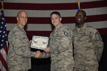 Airmen receive certificates for their selection to staff sergeant Aug. 24, 2017, at McConnell Air Force Base, Kan. The Air Force selected 14,181 senior airmen for promotion, 186 of which are assigned to McConnell. (U.S. Air Force photo/Airman 1st Class Erin McClellan)