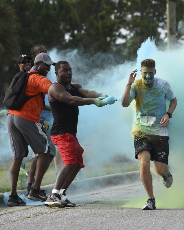 – In a multi-tiered effort to raise esprit de corps, community outreach, and raise money for the 2017 Tyndall Air Force Ball, Tyndall hosted its second annual 5K color run/walk Aug. 26, 2017.
The event allowed approximately 100 participants from Tyndall and the surrounding area to enjoy a fun run with their friends and family.