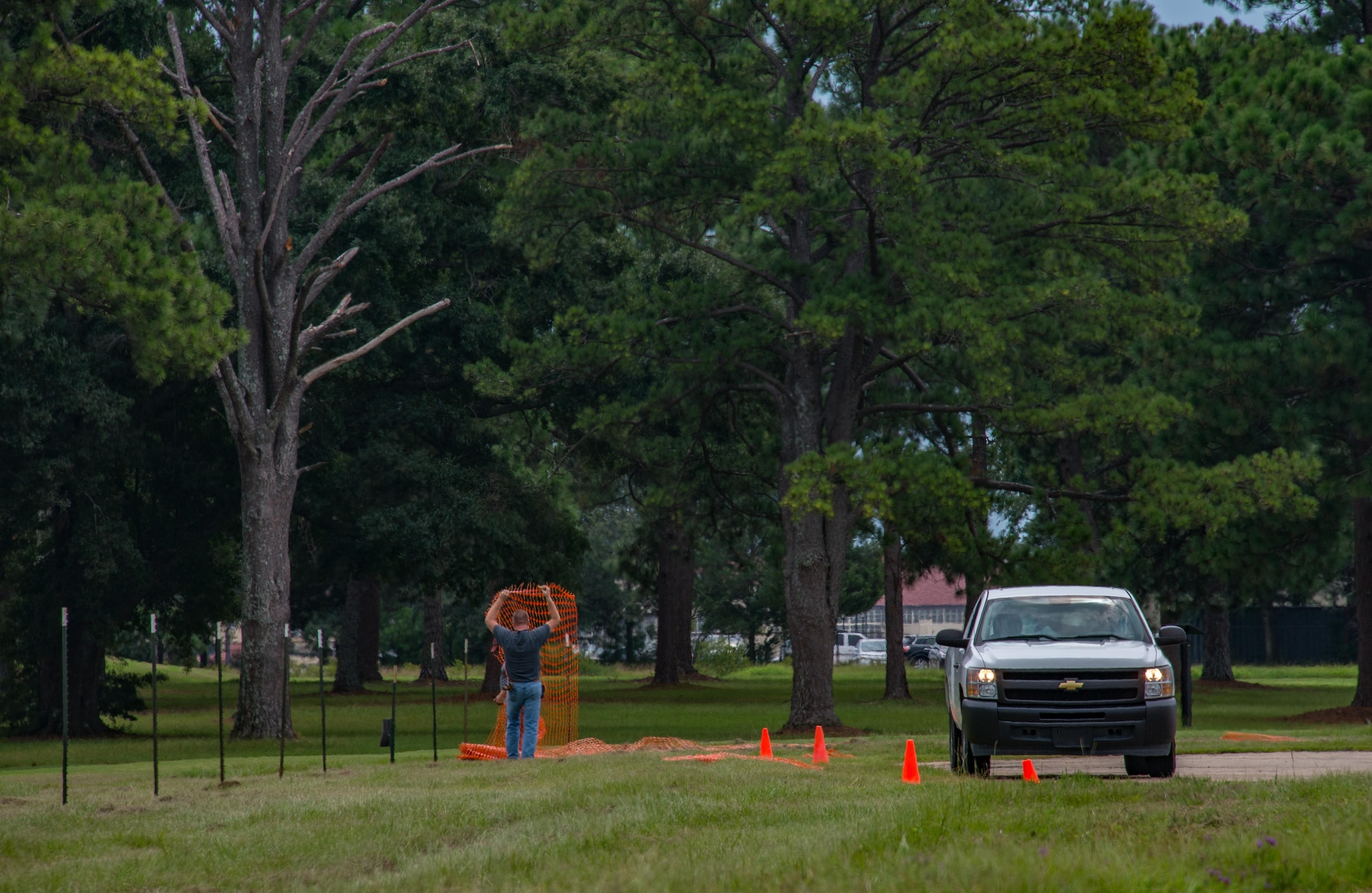 42nd Civil Engineering Squadron erect a fence to protect the flight line from debris during Maxwell Air Force Base's preparations as Incident Staging Base for the Federal Emergency Management Agency response for Hurricane Irma, a Category 5 storm bearing down on the Eastern coast of the U.S., September 6, 2017.