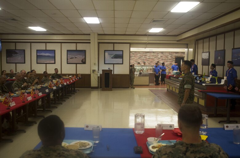 U.S Marine Corps Col. Raul Lianez, the commanding officer of Marine Corps Base Hawaii, speaks to guests after the Chef of the Quarter cook-off competition at Anderson Hall aboard MCB Hawaii, August 23, 2017. After a series of evaluations to include a 50-question written test, an oral board and a uniform inspection, the U.S. Marines with top three highest combined scores were selected to be a part of the cook-off. The competitors used chicken, curry, cream cheese and kiwi fruit as items for their appetizer, entrée and desserts. (U.S. Marine Corps photo by Cpl. Zachary Orr)
