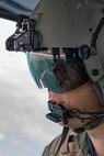 Tech. Sgt. Nicholas Poe, 459th Airlift Squadron special missions aviator, communicates with crew members