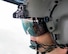 Tech. Sgt. Nicholas Poe, 459th Airlift Squadron special missions aviator, communicates with crew members over Odawara City, Kanagawa Prefecture, Japan, Sept. 1, 2017, during the 2017 Big Rescue Kanagawa Disaster Prevention Drill. Airmen of the 459 AS demonstrated their rescue capabilities among local participants during the Big Rescue Kanagawa for the first time. (U.S. Air Force photo by Yasuo Osakabe)
