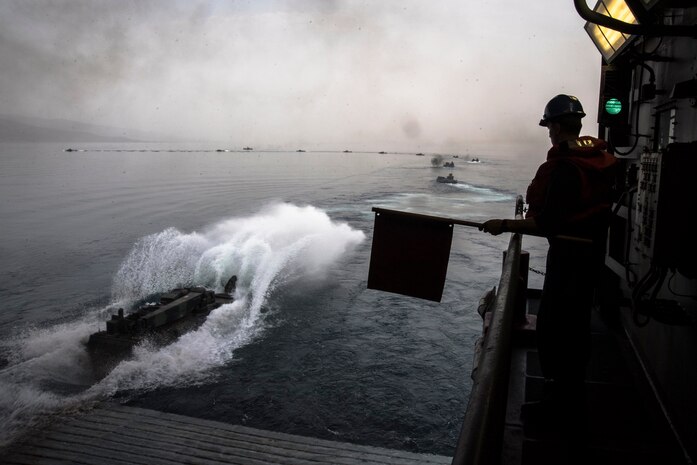 Amphibious assault vehicles assigned to the 15th Marine Expeditionary Unit (MEU) aboard the amphibious transport dock ship USS San Diego (LPD 22) exit the ship’s well deck during Alligator Dagger exercise. Alligator Dagger is a dedicated, unilateral combat rehearsal led by Naval Amphibious Force, Task Force 51/5th Marine Expeditionary Brigade, in which combined Navy and Marine Corps units of the America Amphibious Ready Group and embarked 15th MEU are to practice, rehearse and exercise integrated capabilities that are available to U.S. Central Command both afloat and ashore.